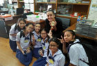 Greenheart Traveler, Carolina Azcuna, with students in Thailand.