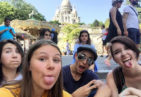 A group photo in front of the Sacre Coeur in Paris, France.